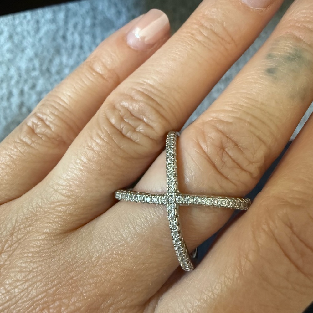 Elegant Silver Crossover Ring